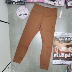 Quần legging dài Victoria Secret 1 túi dây kéo cạp cao bên hông đục lỗ VSX Essential thun lạnh màu nâu 415404qd6